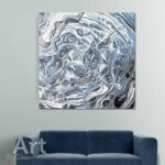 Handgemaakt zwart-wit canvas met speelse, goudkleurige patronen; geeft je interieur warmte en karakter. Met Art By Daan signatuur.