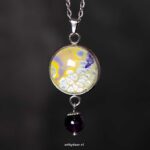 Unieke handgemaakte ketting met geel-paarse hanger en amethist