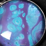 Aparte handgemaakte ketting met turquoise-paarse hanger en amethist