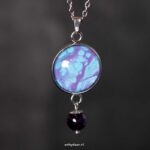 Aparte handgemaakte ketting met turquoise-paarse hanger en amethist